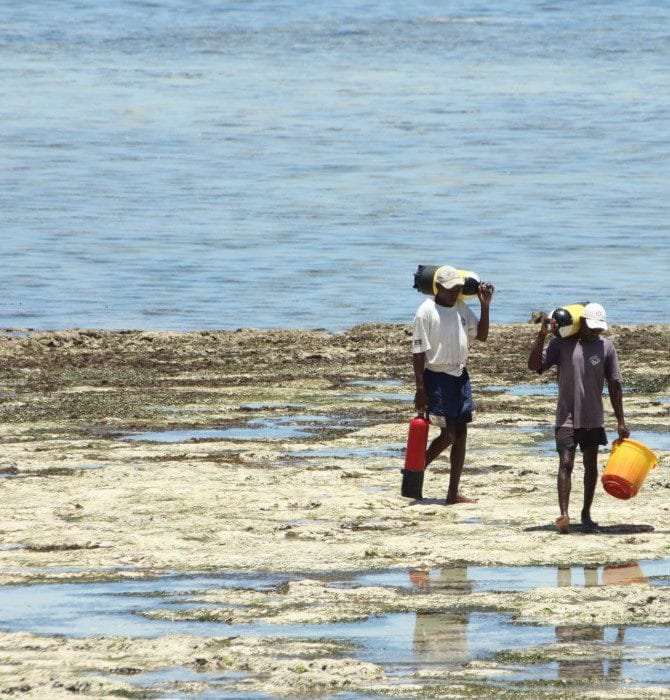 Angler fishing in Kenya’s Indian Ocean during a coastal fishing competition at sunrise