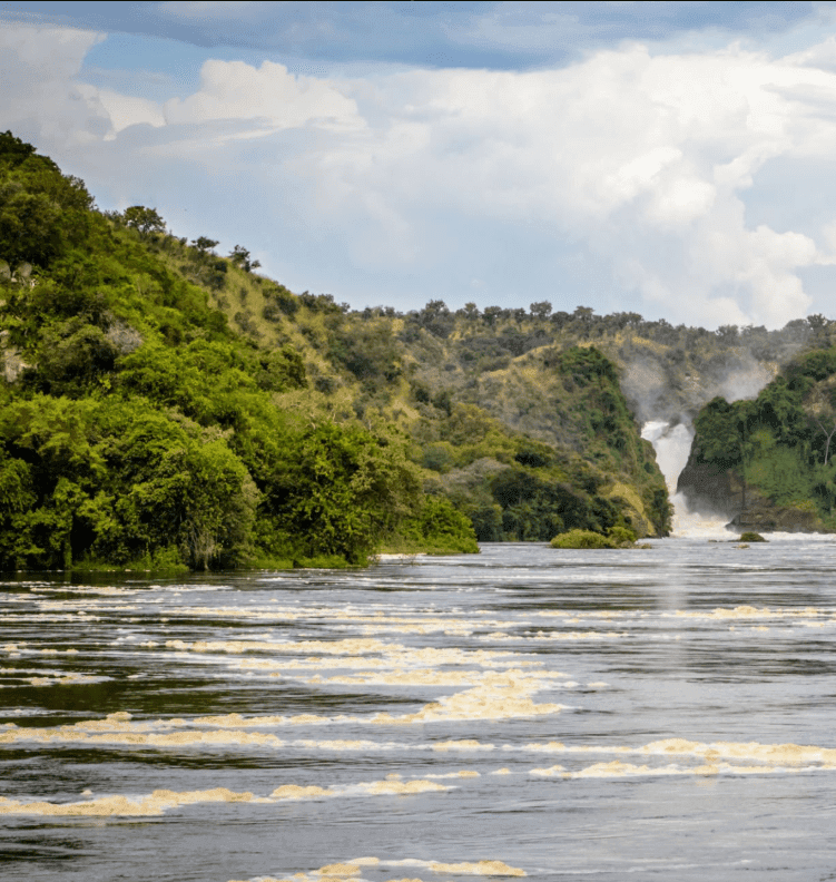 Adventurers rafting on Rwanda’s Nyabarongo River—How safe is white water rafting here? Guides ensure safety with helmets and life jackets.